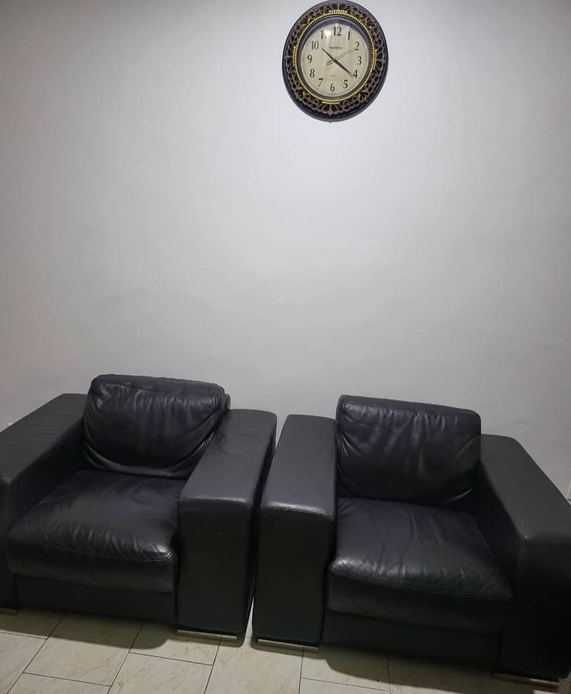 leather single seater 2 black sofas 0