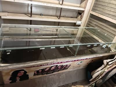 Shop counter  and racks and door and ceiling