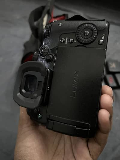 Lumix camera gh5 . With 14-42mm lens 3.5 and 25mm 1.7 with bag and 4btr