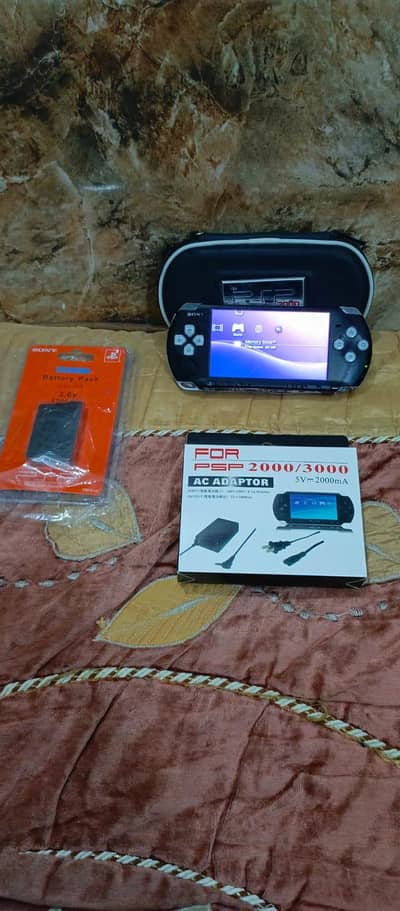 PSP slim 3000 model jelbreak 32gb memory card 35 games insttal