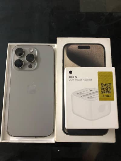 Apple iPhone 15 Pro with box and charger