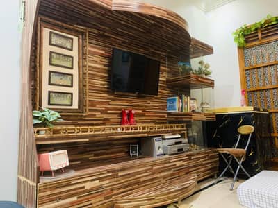 Wooden TV Wall Unit .