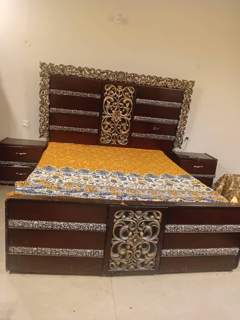 bed with side table 0