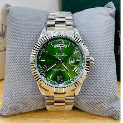 Rolex oyster perpetual green dial