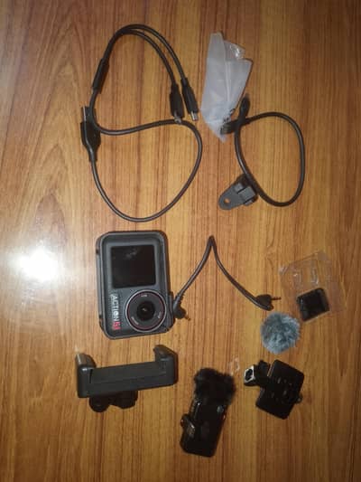dgi action 5 pro camera only one month use all acassry available