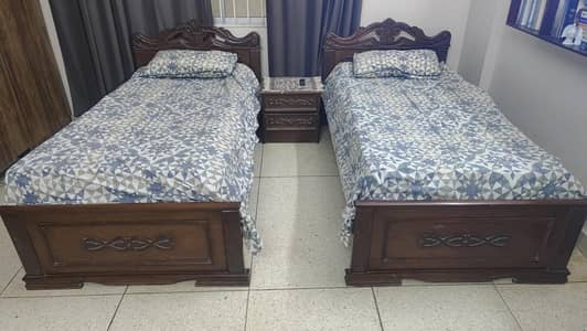 TWO SINGLE WOODEN BEDS With Carvings in Great Condition.