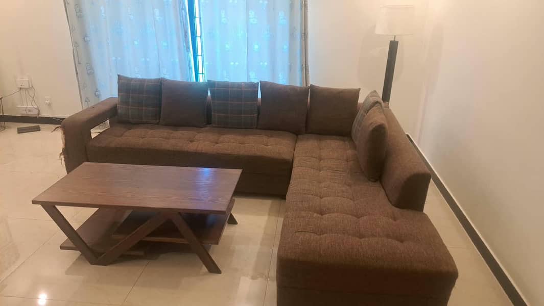 L shape sofa in good condition 0