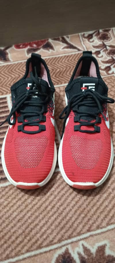 Red knit sports sneakers shoes