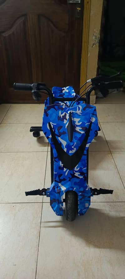 Electric Drift Trike / Scooter (Blue Camo) – Brand New Condition