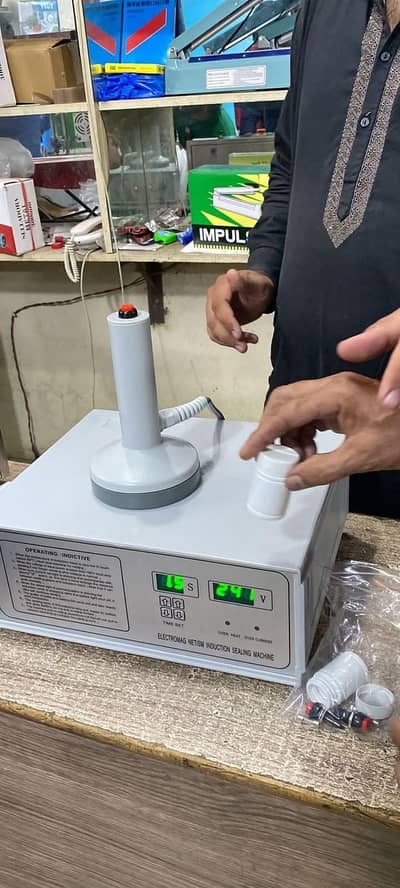 induction sealing machine available zero meter factory rate