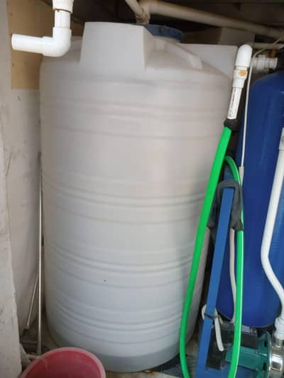 Two 1400 Liter Water Storage Tanks