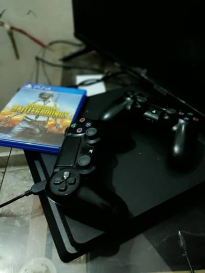 ps4 slim with 5 games and 2 orignal controllers with box