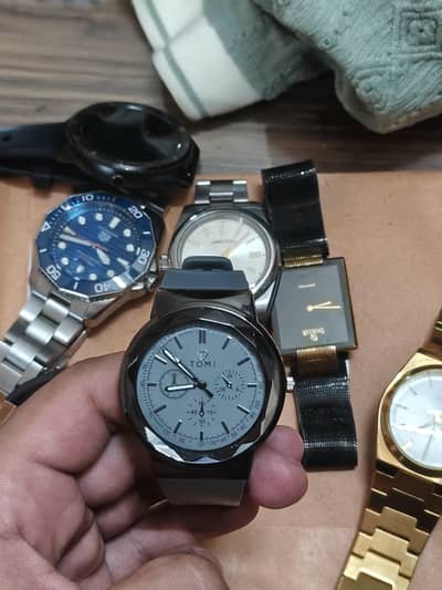 men watch,tomi watch, quartz ,grey color