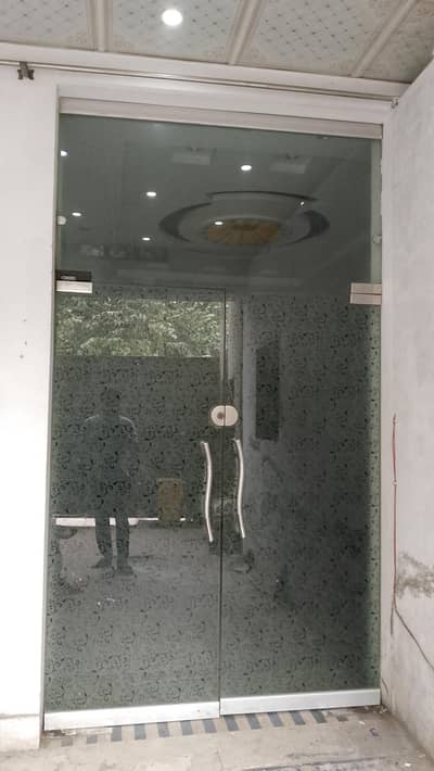 12mm Thick glass door | 9.5 feet height | double door excellent condi