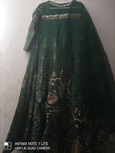 Elegant bottle green printed maxi frock for mehndi and wedding wear