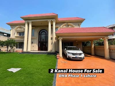 2 Kanal Slightly Used Spanish Design Well Maintained 6-Bedroom Semi Basement Bungalow For Sale at Prime Location of DHA Lahore Near To Park Masjid & Commercial Market .