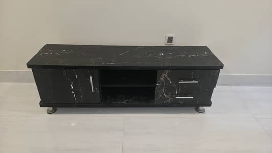 TV Rack Size 5 ft long. Almost new in condition