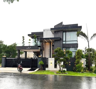 One Kanal Corner Brand New Luxury Ultra-Modern Design Most Beautiful Full Basement Fully Furnished Home Theater Swimming Pool Bungalow For Sale At Prime Location Of DHA Lahore Near To Park Masjid & Commercial Market.