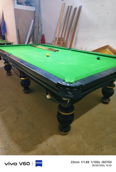 one table Snooker and one billiard with cue's and bolls