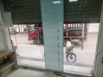 Glass door for shop front Size 9.5ft by 9ft