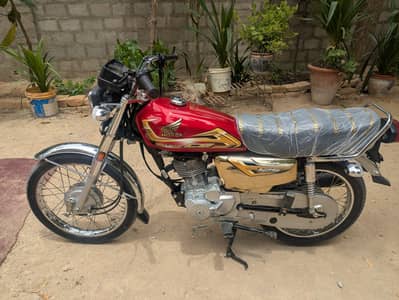 125 gold like brand new 5th month