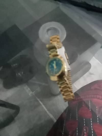 Golden wrist watch