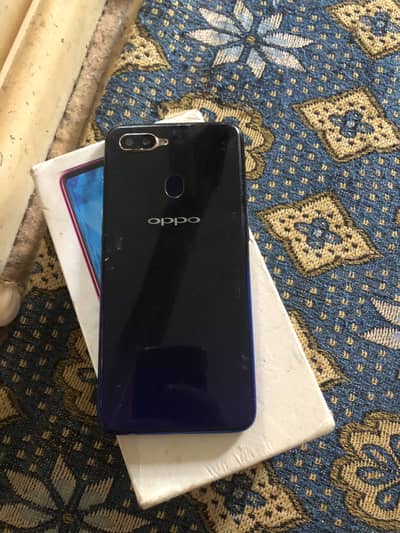 OPPO F9 with boxes