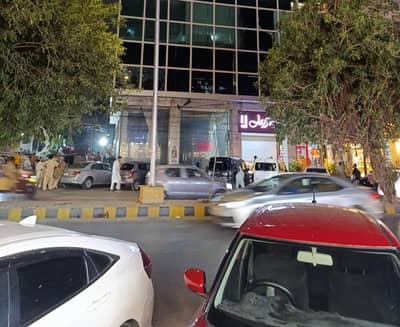 Double height aur 30ft corner front ground for sale at tariq road