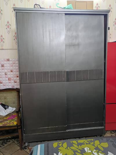 wooden almari with slides door