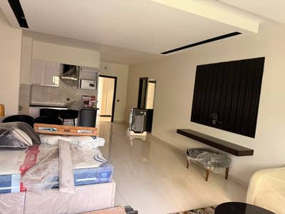 FULLY FURNISHED LUXURY APARTMENT FOR SALE ON MM ALAM ROAD, LAHORE