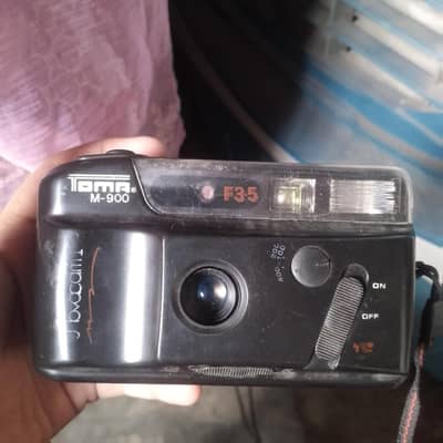 Toma M-900 camara
