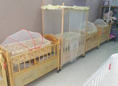 BABY COT IS URGENT FOR SALE AT VERY REASONABLE PRICE