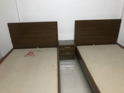 2 singles beds 4x6.5  with side table