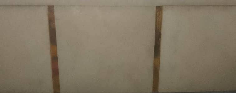 bed and side tables with mattress