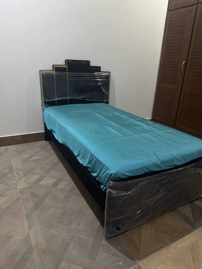 Single bed with mattress