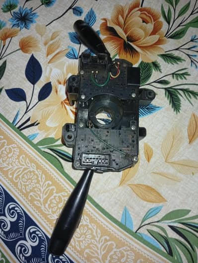 santro headlight dipper assembly