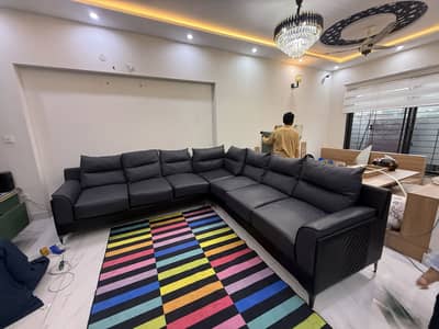 Grey leather L shape sofa