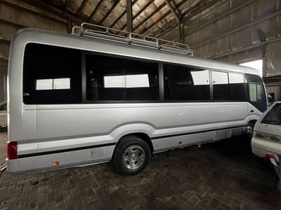 Toyota Coaster 5c Bus(29) seater available for rent
