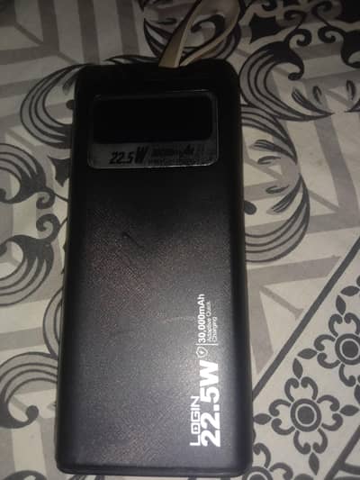 LOGIN 22. W  30,000mAh Adaptive quick charging .