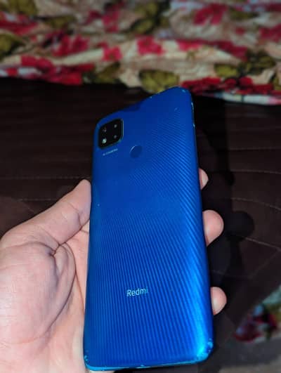 Xiaomi Redmi 9C with cable
