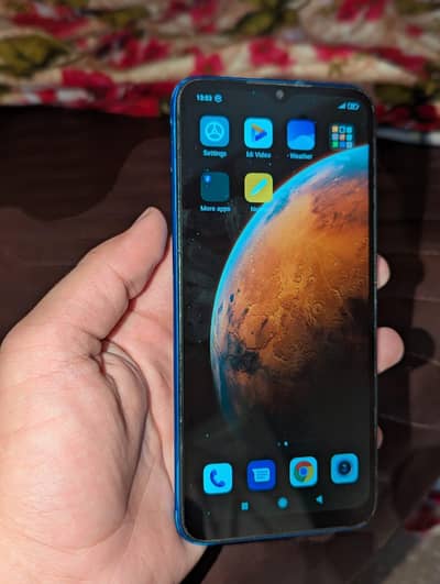 Xiaomi Redmi 9C with cable