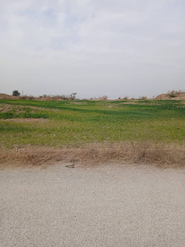 Main double road 35x60 plot available 0