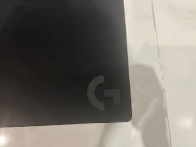 Logitech mouse little bit used small creases perfect glide.