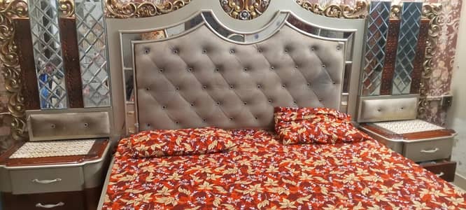 king size bed . . 2 bedside table, dressing table, 4 door almaari