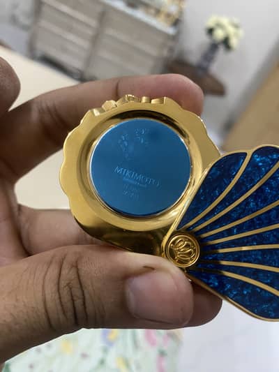 Mikimoto Japan", "Vintage Clamshell Clock", and "Real Akoya Pearl"