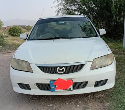 Mazda 323 2014