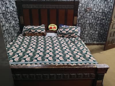 king size bed with spring mattress.