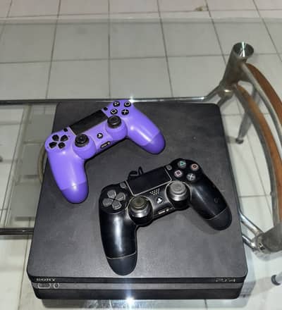 PS4 SLIM WITH TWO CONTROLLERS