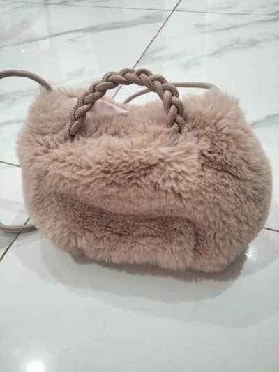 furry leather bag