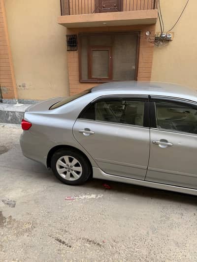Toyota Corolla Altis 2013 number 03006633180